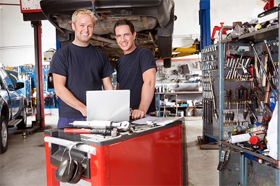 Two men working in auto shop